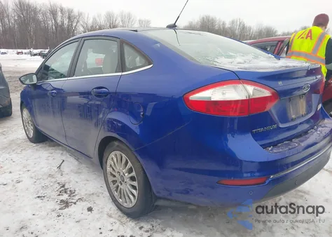 2014 Ford Fiesta Titanium z USA, uszkodzony, nr VIN 3FADP4CJ3EM195594